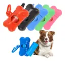 DISPENSADOR DE BOLSAS CON FORMA DE HUESO + 1 ROLLO (COLOR VARIADO)